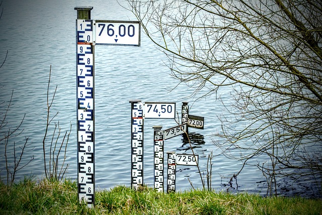 residential lithium battery storage system with monitoring display showing charge levels